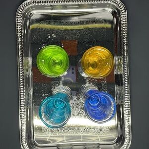 Four vibrant colored shot glasses Vintage preowned no damage